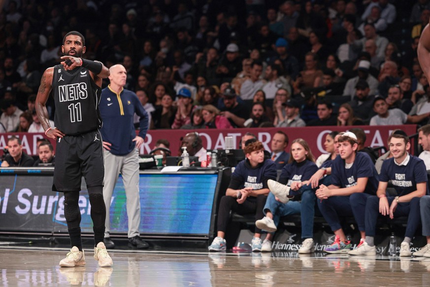 NBA, Basketball Herren, USA Indiana Pacers at Brooklyn Nets Oct 31, 2022 Brooklyn, New York, USA Brooklyn Nets guard Kyrie Irving 11 reacts during the first half against the Indiana Pacers at Barclays ...