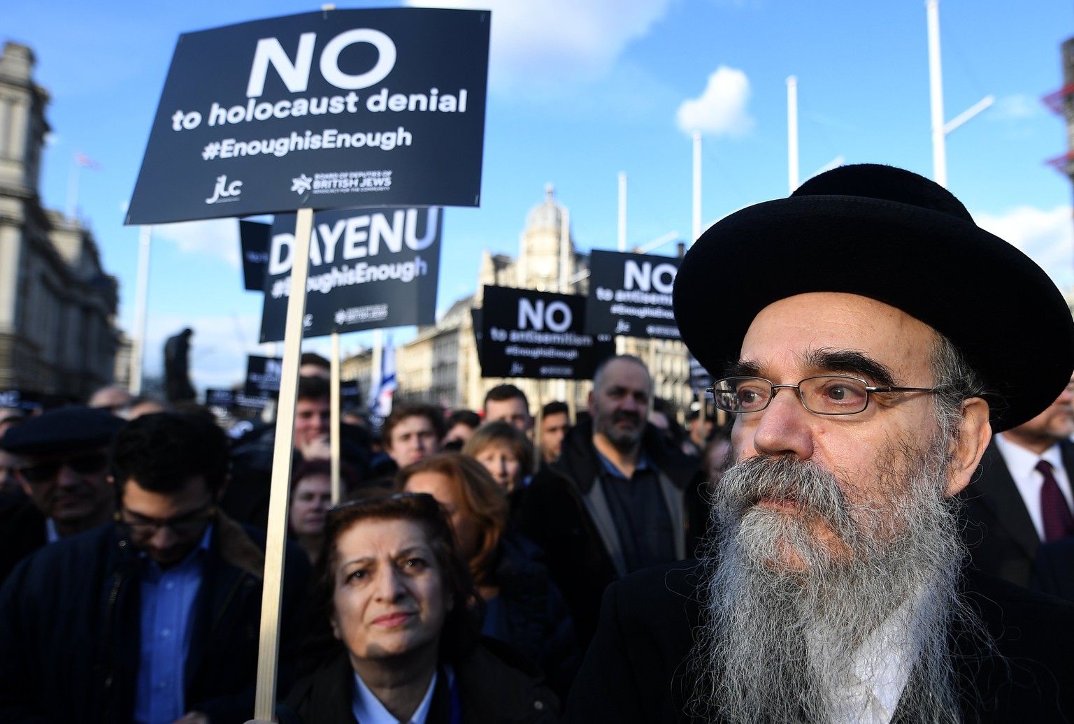 epa06630874 Members of London&#039;s Jewish community protest outside The British Houses of Parliament in London, Britain, 26 March 2018. The Jewish community have called on Labour leader Jeremy Corby ...