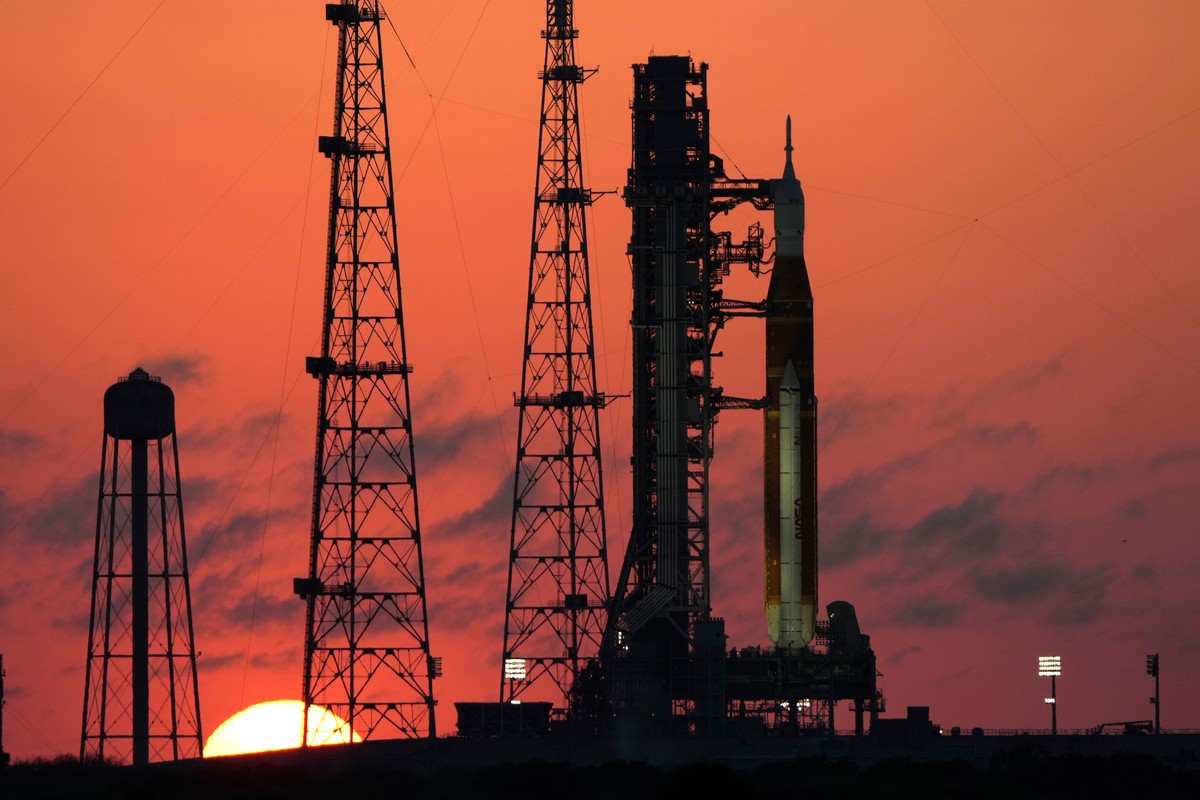 NASA's Space Launch System rocket with the Orion spacecraft set for the Artemis 2 mission is seen on Launch Complex 39B at sunrise at the Kennedy Space Center, Tuesday, March 24, 2026, in Cape Ca ...