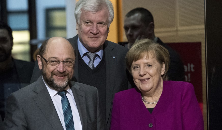 Martin Schulz, chairman of the German Social Democratic Party (SPD), front left, German Chancellor and chairwomen of the German Christian Democratic Union Party (CDU), Angela Merkel, front right, and  ...