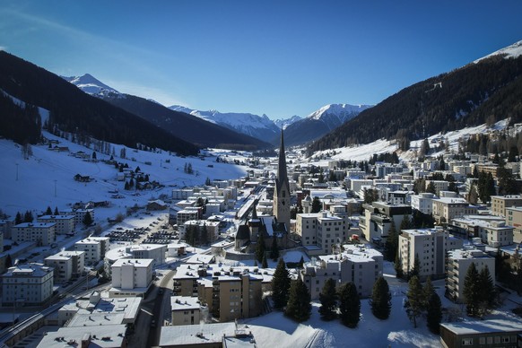 epa12631190 A picture taken with a drone shows a general view of Davos prior to the 56th annual meeting of the World Economic Forum (WEF) in Davos, Switzerland, 06 January 2026. The meeting brings tog ...