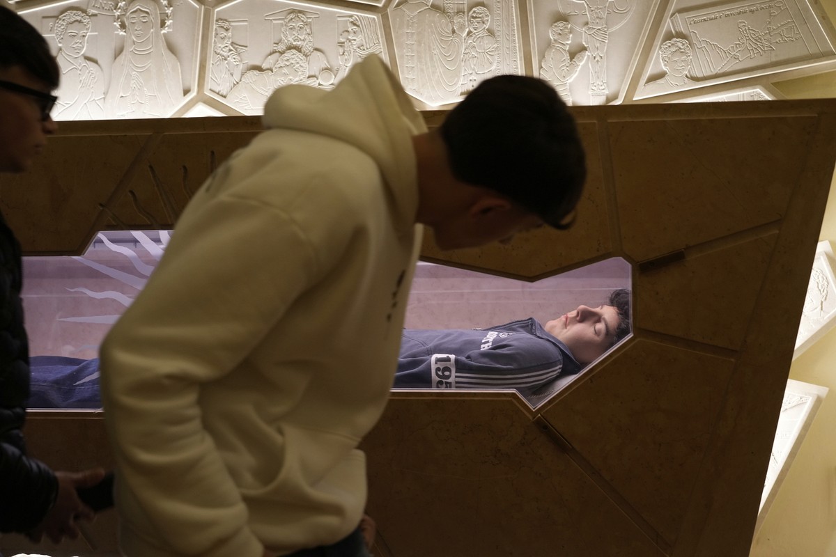 The body of Carlo Acutis, an Italian boy who died in 2006 of leukemia, lies in his tomb in Assisi, Italy, on Saturday, March 1, 2025. (AP Photo/Gregorio Borgia)
Millennial Saint