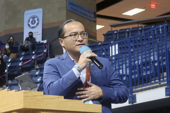 Navajo Nation President Buu Nygren addresses a crowd at an indoor sports arena, Tuesday, Jan. 10, 2023, in Fort Defiance, Ariz. Nygren was sworn in as president and is the youngest person to serve in  ...