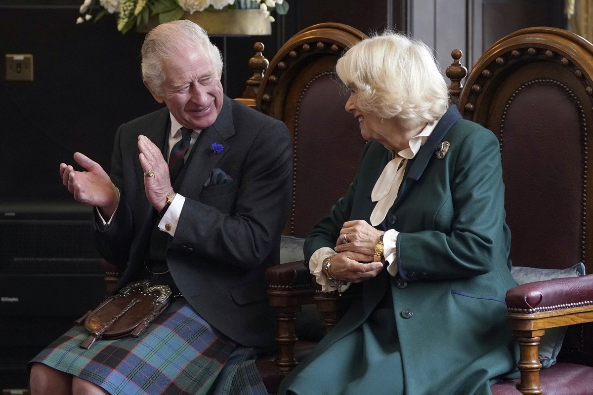 Britain's King Charles III and Camilla, the Queen Consort, attend an official council meeting at the City Chambers in Dunfermline, Fife, to formally mark the conferral of city status on the forme ...