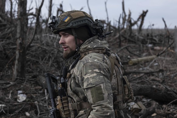 A Ukrainian soldier stands in position on the front-line near Klishchiivka, Donetsk region, Ukraine, Monday, March 18, 2024. (Iryna Rybakova via AP)