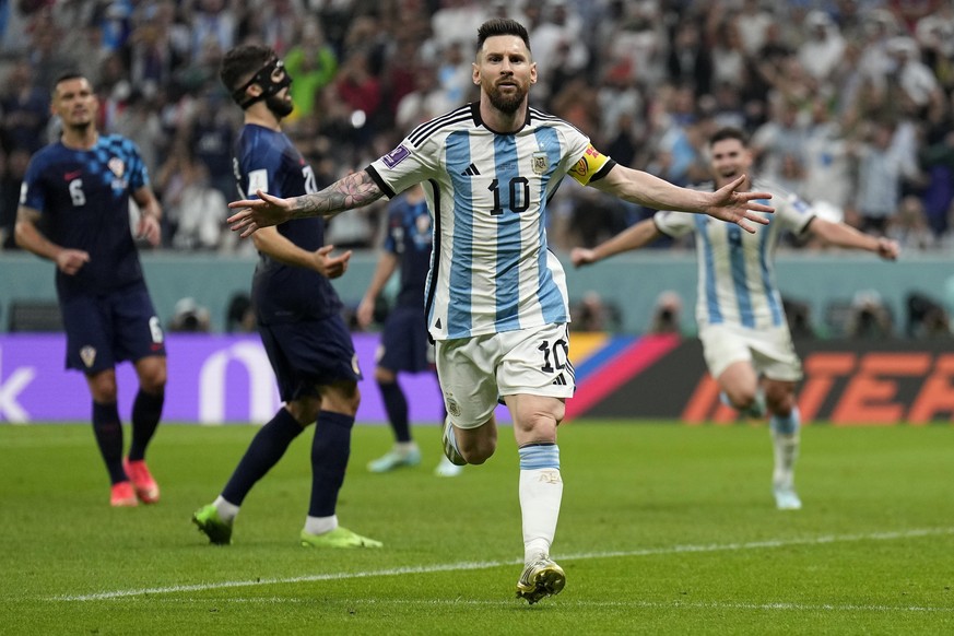 Argentina&#039;s Lionel Messi celebrates after scoring his side&#039;s first goal during the World Cup semifinal soccer match between Argentina and Croatia at the Lusail Stadium in Lusail, Qatar, Tues ...