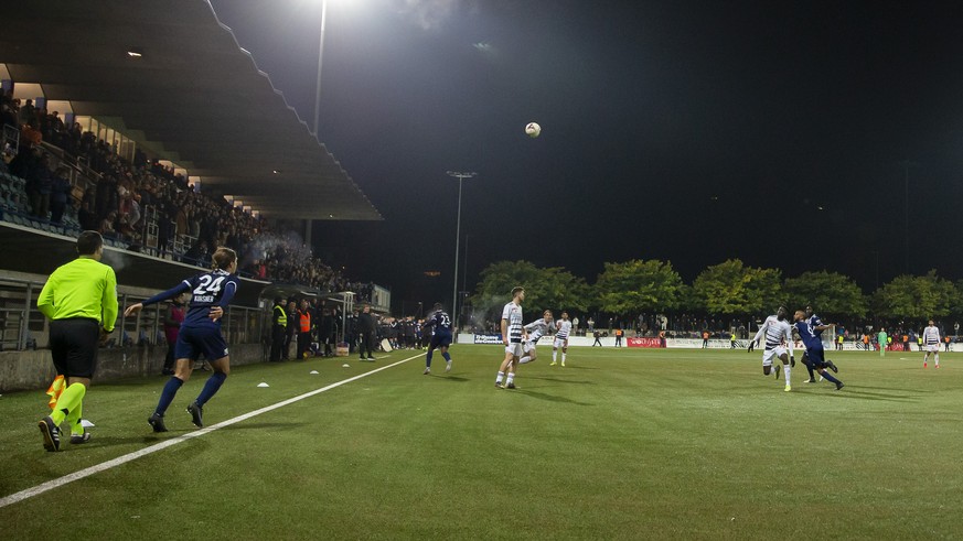 Basel&#039;s players (white) and Etoile Carouge&#039;s players in action, during the Swiss Cup Round of 16 between Etoile Carouge FC and FC Basel, at the Stade de la Fontenette, in Carouge, Switzerlan ...