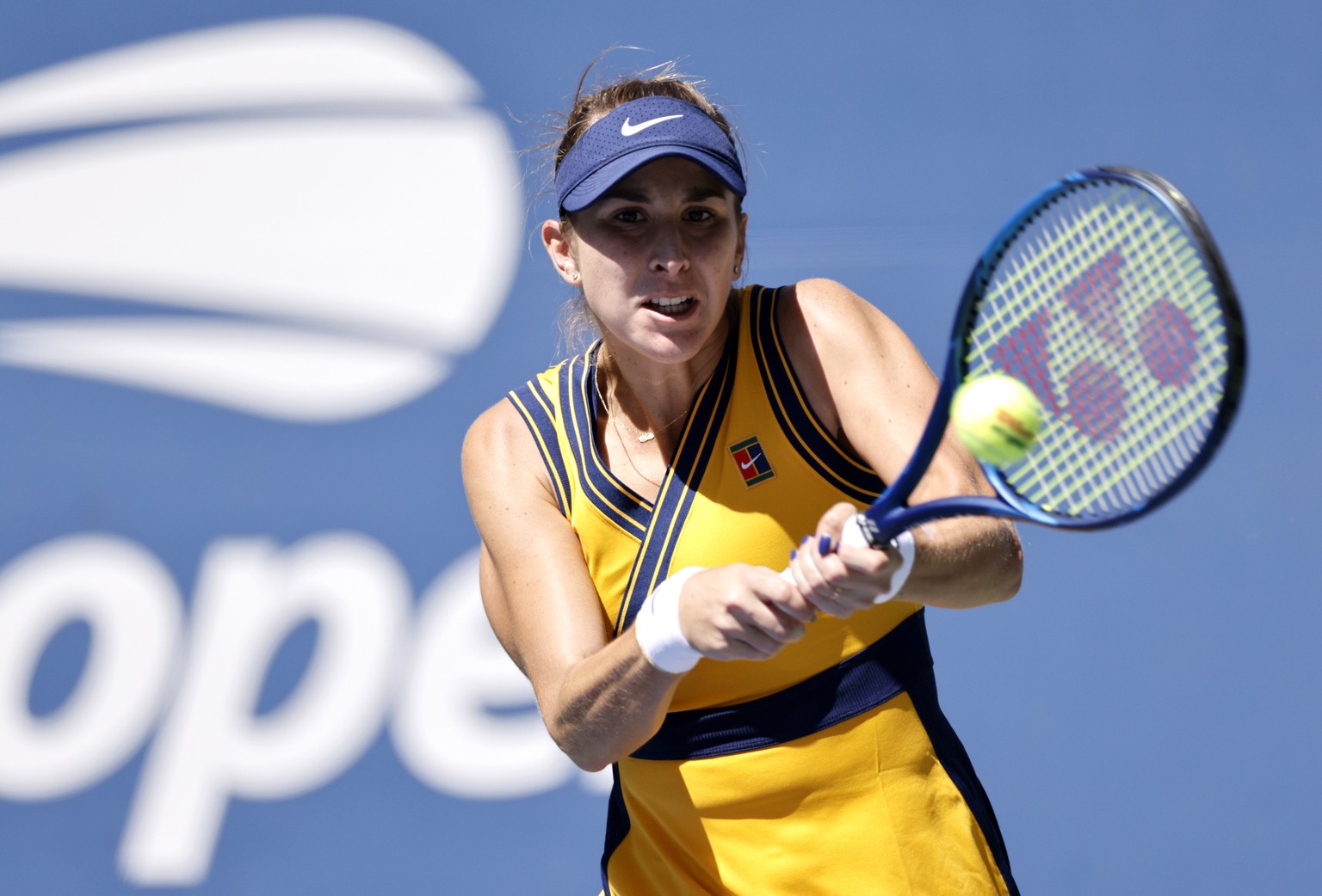 epa09443532 Belinda Bencic of Switzerland hits a return to Martina Trevisan of Italy during their match on the fourth day of the US Open Tennis Championships the USTA National Tennis Center in Flushin ...