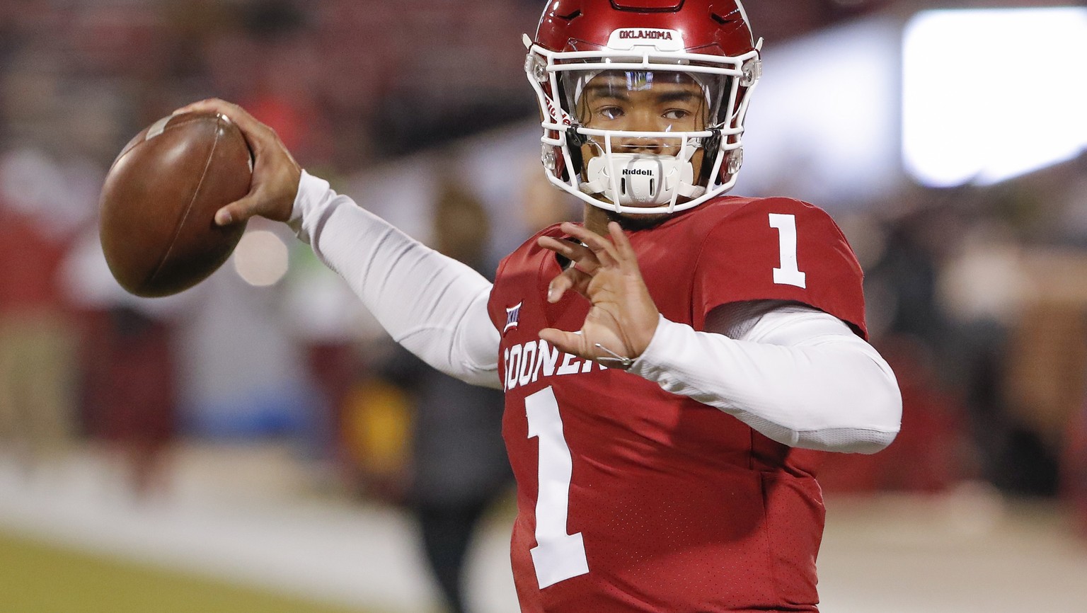 FILE - In this Saturday, Nov. 17, 2018 file photo, Oklahoma quarterback Kyler Murray (1) before the start of an NCAA college football game against Kansas in Norman, Okla. Kyler Murray suddenly has a b ...