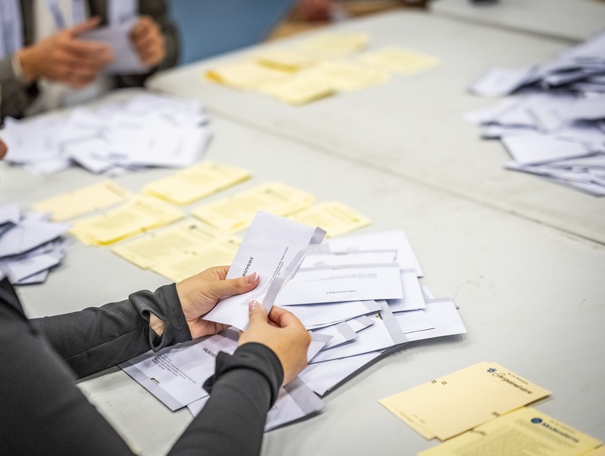 epa13237396 Ballot envelopes are opened during vote counting at the polling station at Kockum Fritid in Malmo, Sweden, 13 September 2026, on election day. Sweden's general election takes place on ...