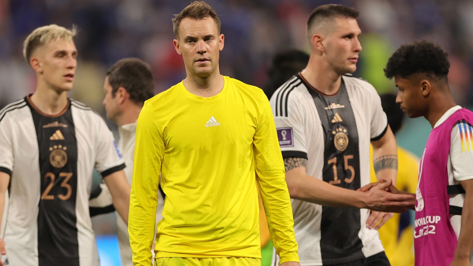 epa10322829 Goalkeeper Manuel Neuer of Germany reacts after losing the FIFA World Cup 2022 group E soccer match between Germany and Japan at Khalifa International Stadium in Doha, Qatar, 23 November 2 ...