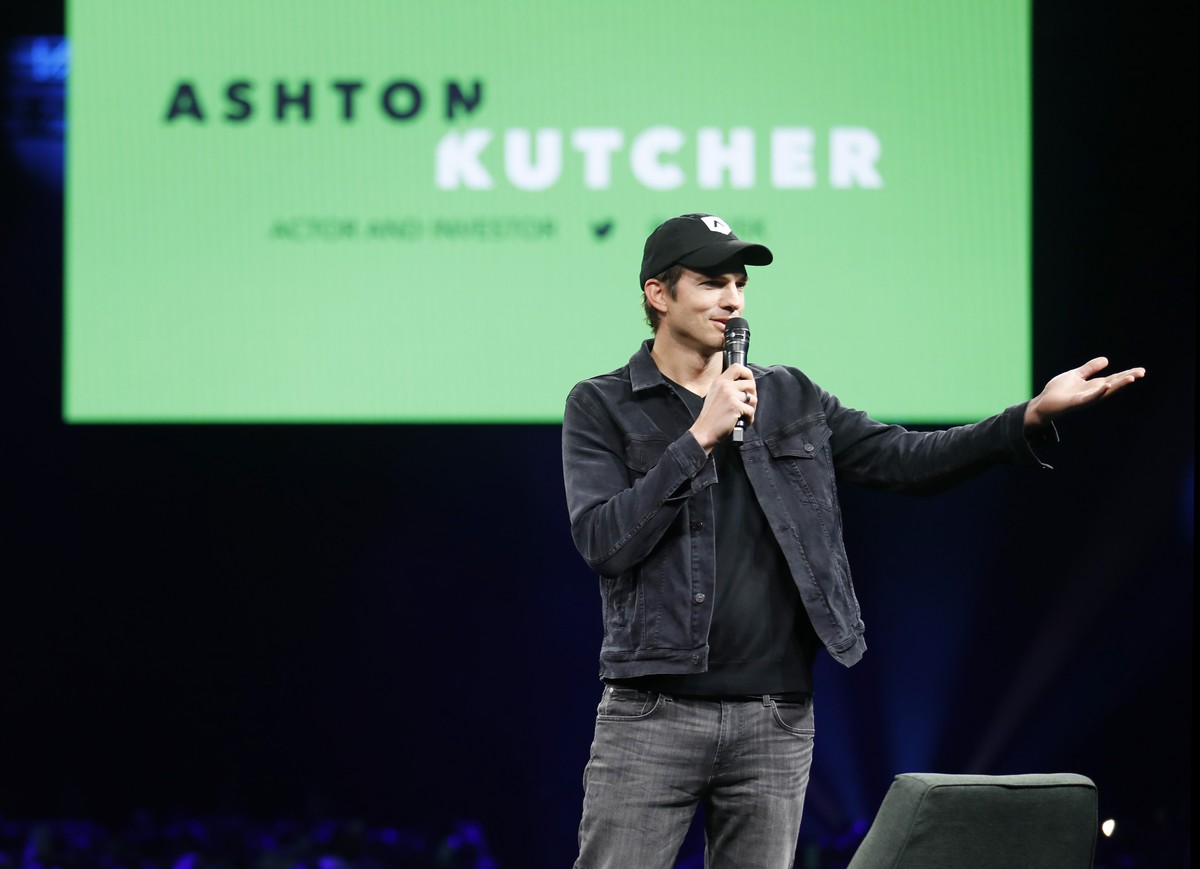 IMAGE DISTRIBUTED FOR QUICKBOOKS - Actor and investor Ashton Kutcher, right, greets the crowd at Intuit's QuickBooks Connect 2019 on Thursday, Nov. 7, in San Jose, Calif. (Adm Golub/AP Images for ...