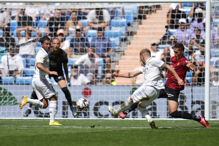 Real Madrid&#039;s Federico Valverde scores his side&#039;s first goal during the Spanish La Liga soccer match between Real Madrid and Mallorca at the Santiago Bernabeu stadium in Madrid, Spain, Sunda ...