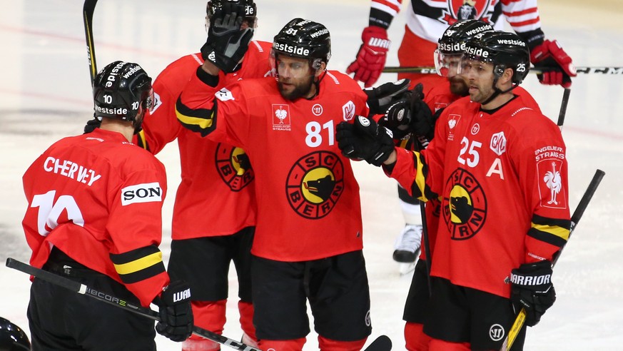 SCB's Thomas Ruefenacht, center, celebrates his goal with team mates during the Champions Hockey League group F match between Switzerland's SC Bern against Czech Republic's Mountfield Hradec Kralove i ...