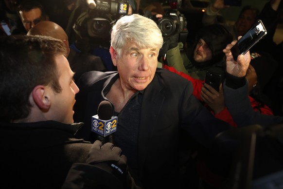 Former Illinois Gov. Rod Blagojevich tries to get into his house as he arrives home in Chicago on Wednesday, Feb. 19, 2020, after his release from Colorado prison late Tuesday. Blagojevich walked out  ...