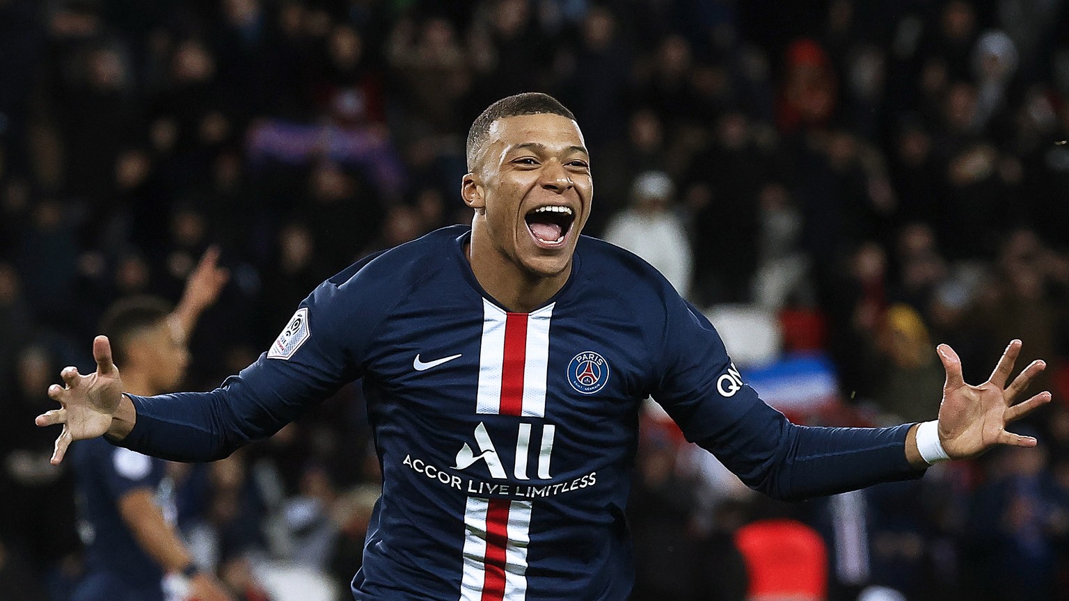 epa08260092 Paris Saint-Germain&#039;s Kylian Mbappe celebrates after scoring the 4-0 lead during the French Ligue 1 soccer match between Paris Saint-Germain (PSG) and Dijon FCO at the Parc des Prince ...