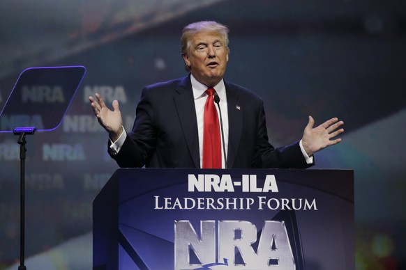 FILE - In this May 20, 2016, file photo, then-Republican presidential candidate Donald Trump speaks at the National Rifle Association (NRA) convention in Louisville, Ky. Firearms enthusiasts who embra ...