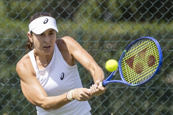 Belinda Bencic of Switzerland hits a return during a training session, ahead of the Wimbledon All England Lawn Tennis Championships in London, on Friday, June 26, 2026. The Wimbledon Tennis Championsh ...