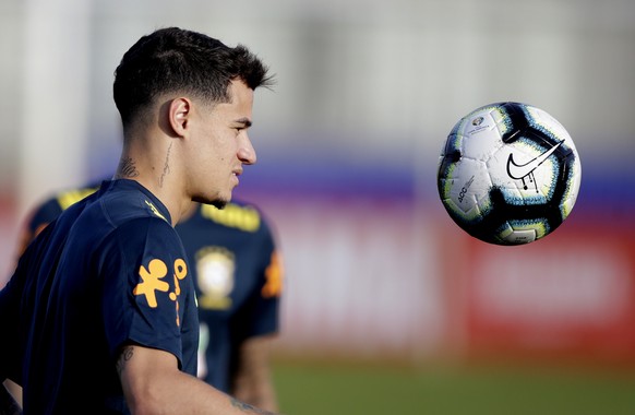 Brazil's Philippe Coutinho eyes the ball during a practice session in Porto Alegre, Brazil, Friday, June 7, 2019. Brazil opens the Copa America tournament next Friday against Bolivia in Sao Paulo. (AP ...
