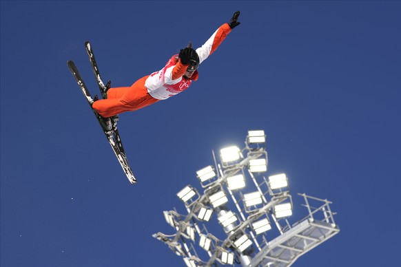 Switzerland's Alexandra Baer competes during the women's aerials qualification at the 2022 Winter Olympics, Monday, Feb. 14, 2022, in Zhangjiakou, China. (AP Photo/Francisco Seco)