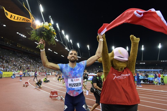 Kariem Hussein of Switzerland reacts after the 400m Hurdles Men, during the Weltklasse IAAF Diamond League international athletics meeting in the Letzigrund stadium in Zurich, Switzerland, Thursday, A ...