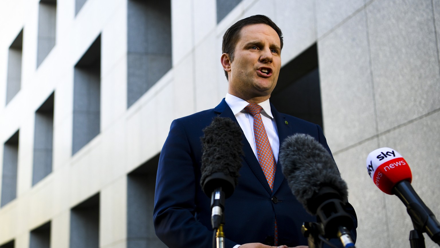 epa09272236 Australian Immigration Minister Alex Hawke speaks to the media during a press conference at Parliament House in Canberra, Australian Capital Territory, Australia, 15 June 2021. A statement ...