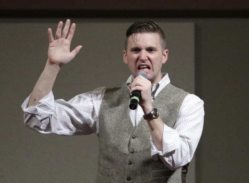 FILE - In this Dec. 6, 2016, file photo, Richard Spencer, who leads a movement that mixes racism, white nationalism and populism, speaks at the Texas A&amp;M University campus in College Station, Texa ...
