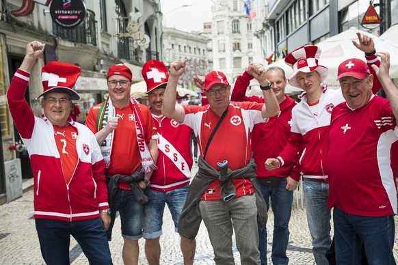 Supporters from Switzerland pose in the street before the UEFA Nations League semi-final soccer match between Portugal and Switzerland at the Dragao stadium in Porto, Portugal, on Wednesday, June 5, 2 ...