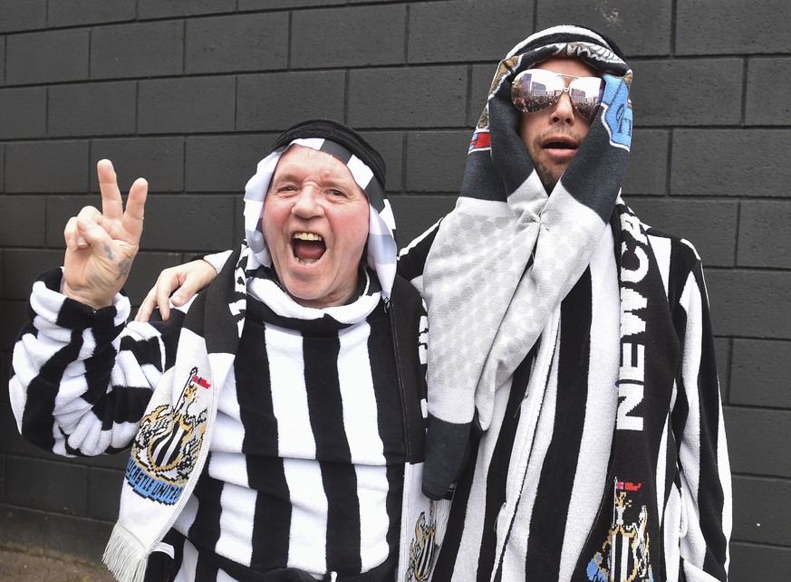 epa09528683 Fans of Newcastle outside the stadium before the English Premier League match between Newcastle United and Tottenham Hotspur, Britain, 17 October 2021. EPA/PETER POWELL