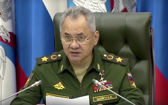 In this handout photo taken from video released by Russian Defense Ministry Press Service, Russian Defense Minister Sergei Shoigu speaks in televised remarks in Moscow, Wednesday, Sept. 21, 2022. Russ ...