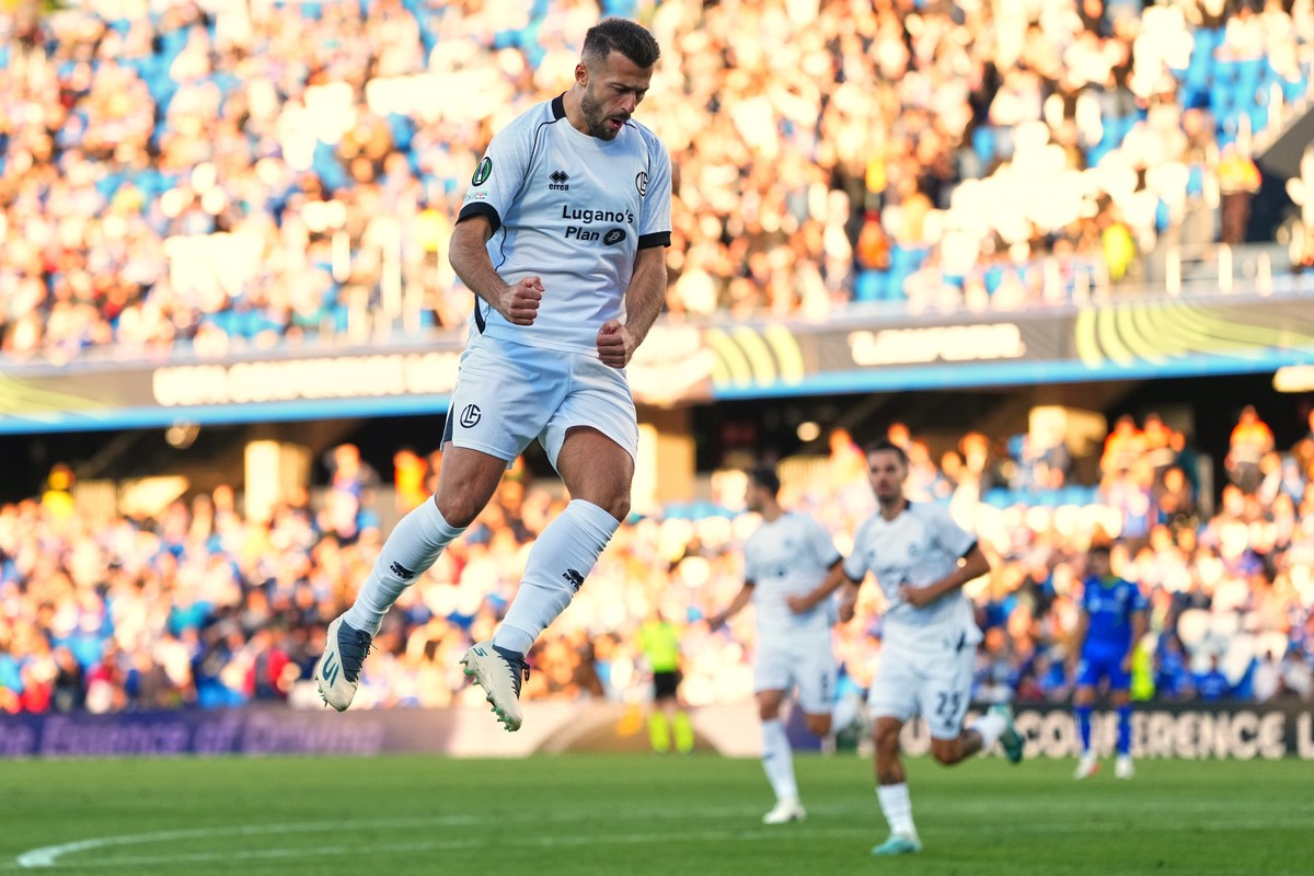 Lugano's Albian Ajeti celebrates after scoring the opening goal during the Conference League opening phase soccer match between Getafe and Lugano in Getafe, Spain, Thursday, Oct. 22, 2026. (AP Ph ...