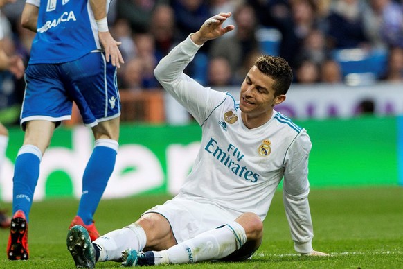 epa06461726 Real Madrid&#039;s Portuguese striker Cristiano Ronaldo reacts during a Spanish league La Liga soccer match between Real Madrid and Deportivo at Santiago Bernabeu stadium in Madrid, Spain, ...