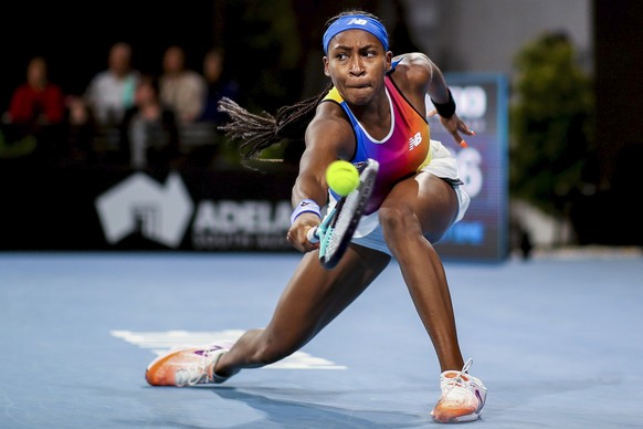 Cori Gauff of the United States plays a backhand return to Ashleigh Barty of Australia during their singles match at the Adelaide International Tennis Tournament, at Memorial Drive, in Adelaide, Austr ...