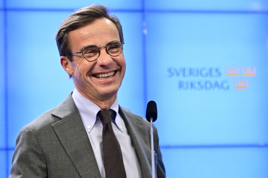 The Moderate party leader Ulf Kristersson speaks at a press conference on the formation of the new Swedish government, in Stockholm, Wednesday, Oct. 12, 2022. (Jonas Ekströmer/TT News Agency via AP)