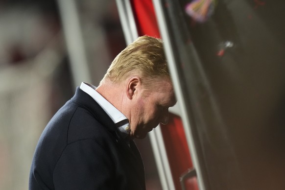 Barcelona's head coach Ronald Koeman heads back down the tunnel at half time during a Spanish La Liga soccer match between Rayo Vallecano and FC Barcelona at the Vallecas stadium in Madrid, Spain, Wed ...