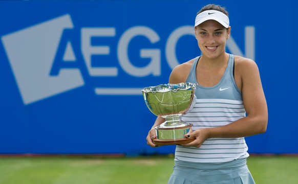 NOTTINGHAM - ENGLAND - JUNE 15: Ana Konjuh of Croatia celebrates winning the Aegon Open Nottingham against Monica Niculescu of Romania with the Elena Baltacha Trophy on day eight of the WTA Aegon Open ...