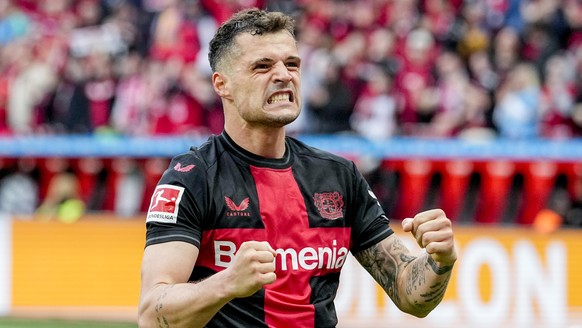 Leverkusen&#039;s Granit Xhaka celebrates his side&#039;s6second goal during a German Bundesliga soccer match between Bayer Leverkusen and Werder Bremen in Leverkusen, Germany, Sunday, April 14, 2024. ...