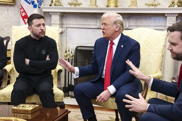 epa11930783 Ukrainian President Volodymyr Zelensky (L) talks with US President Donald Trump (C) and US Vice President JD Vance (R) in the Oval Office of the White House in Washington, DC, USA, 28 Febr ...