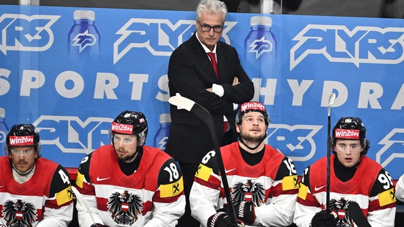 epa12088877 Austria&#039;s head coach Roger Bader follows the 2025 IIHF Ice Hockey World Championship match between Sweden and Austria, in Stockholm, Sweden, 10 May 2025. EPA/CHRISTINE OLSSON SWEDEN O ...