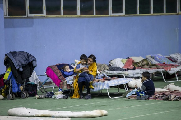 epa09813593 People evacuated from Ukraine are seen at the refugee trial camp in the athletics arena in Chisinau, Moldova, 09 March 2022. According to UNHCR figures, more than two million Ukrainians ha ...