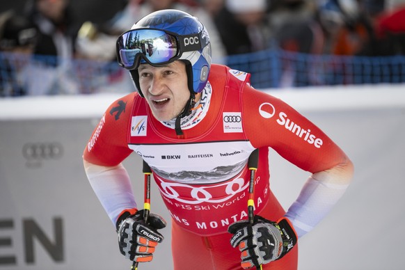 epa12694052 Marco Odermatt of Switzerland reacts in the finish area during a training session for the men's Downhill race at the Alpine Skiing FIS Ski World Cup, in Crans-Montana, Switzerland, 31 ...
