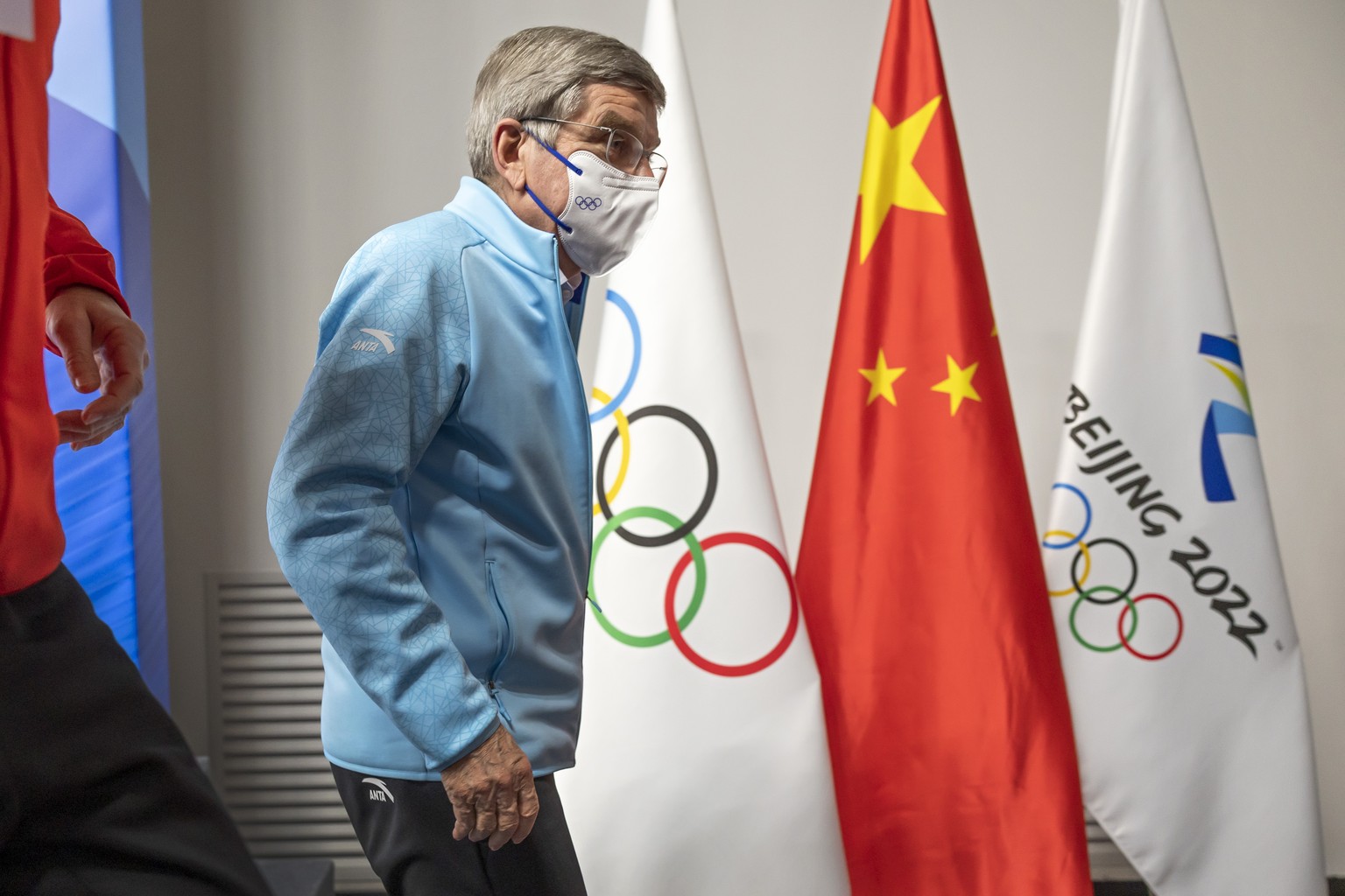 International Olympic Committee (IOC) President Thomas Bach leaves the podium after a new press conference in the Main Media Centre (MMC) at the 2022 Olympic Winter Games in Beijing, China, on Friday, ...