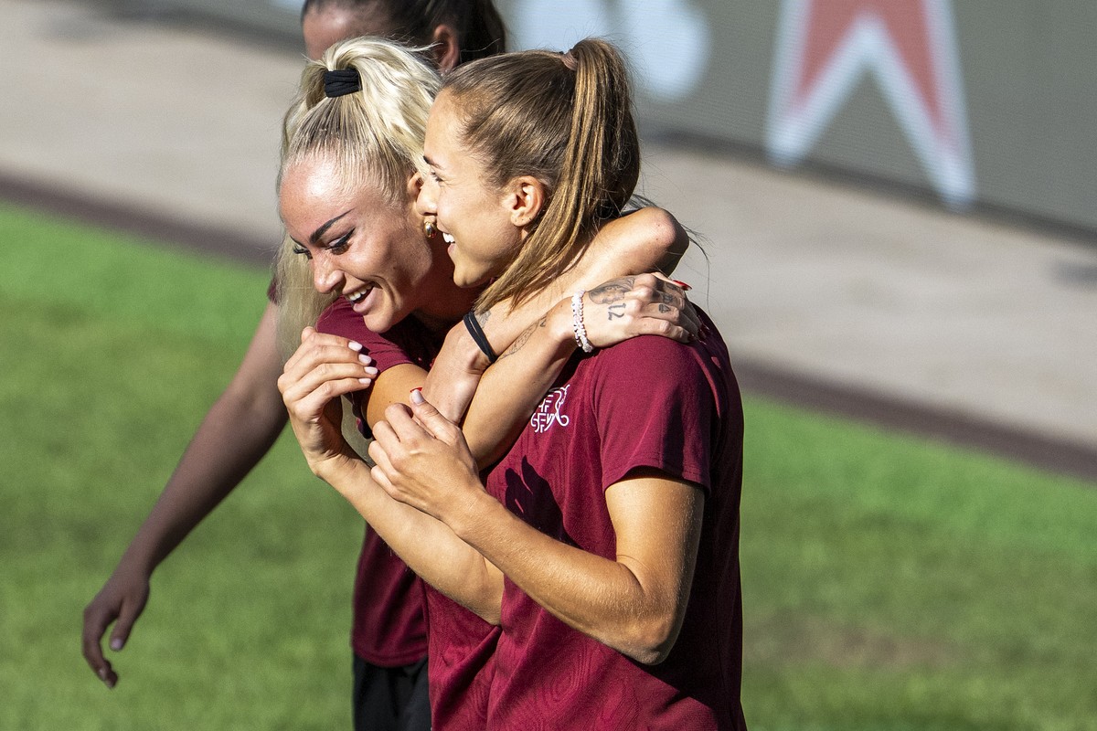 Switzerland's Alisha Lehmann, left, and Lia Waelti, react during a training session the day before the UEFA Women's EURO 2025 Group A soccer match between Switzerland and Iceland at the Wank ...