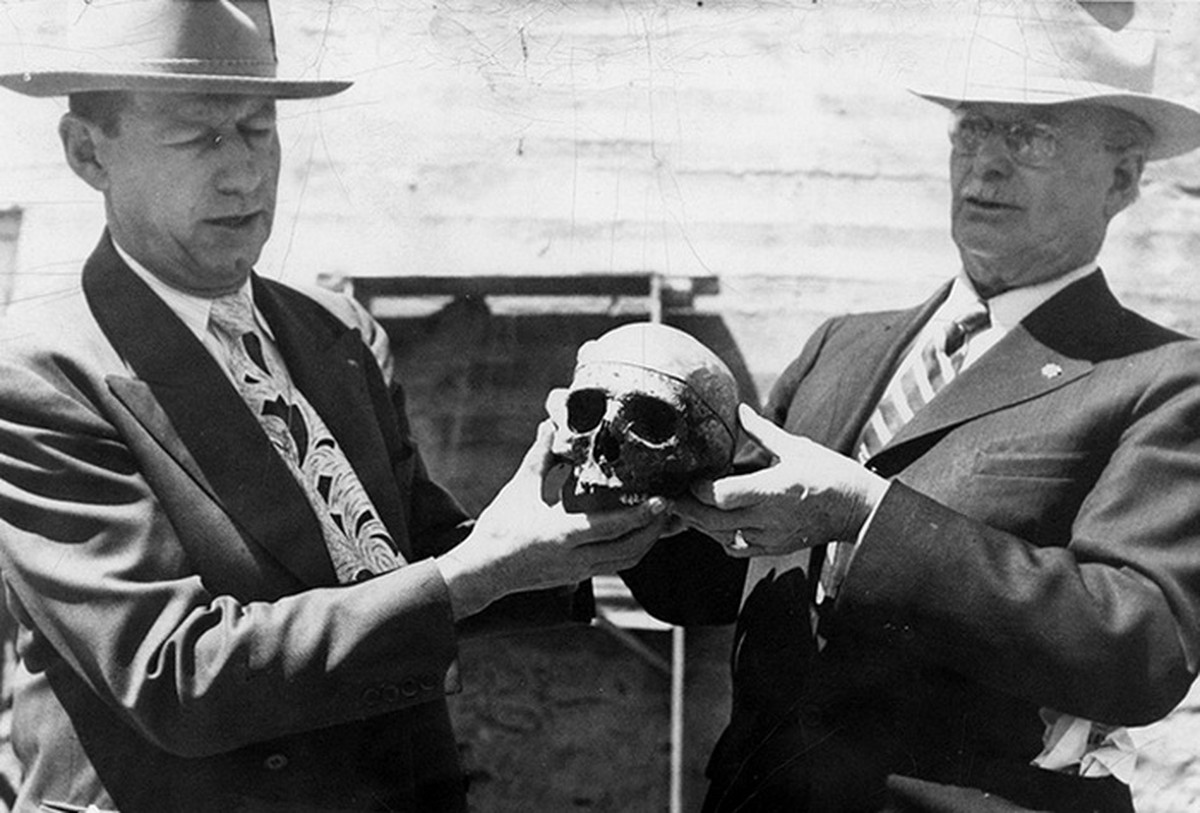 The two halves of Big Nose George Parrott's skull were briefly reunited in 1950. Lou Nelson, left, was the husband of Dr. Lillian Heath, who had kept the top half since the time of Dr. Thomas Mag ...