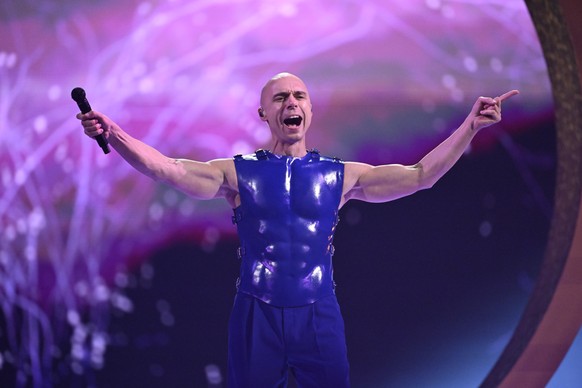 epa11331280 Dons representing Latvia with the song Hollow performs on stage during the first dress rehearsal before the final of the 68th edition of the Eurovision Song Contest (ESC) at Malmo Arena, i ...