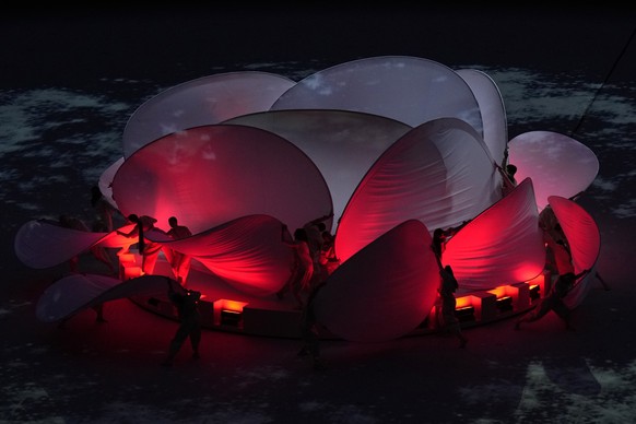 Artists perform before the World Cup final soccer match between Argentina and France at the Lusail Stadium in Lusail, Qatar, Sunday, Dec. 18, 2022. (AP Photo/Hassan Ammar)