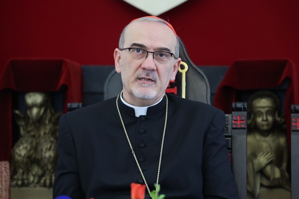epa12046122 Latin Patriarch of Jerusalem, Archbishop Pierbattista Pizzaballa speaks during a press conference at the Latin Catholic patriarchate at the Old City of Jerusalem, 22 April 2025. Pope Franc ...