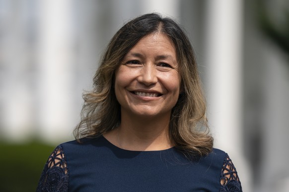 FILE - White House Intergovernmental Affairs director Julie Chavez Rodriguez stands outside the White House on June 9, 2021, in Washington. President Joe Biden is expected to tap Chavez Rodriguez, a s ...