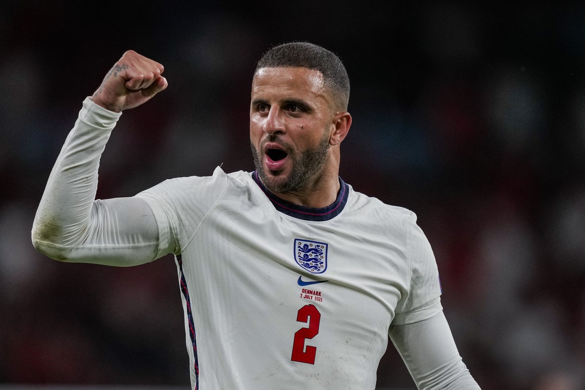 England's Kyle Walker celebrates after winning the Euro 2020 soccer championship semifinal match against Denmark at Wembley stadium in London, Wednesday, July 7, 2021. (AP Photo/Frank Augstein, P ...