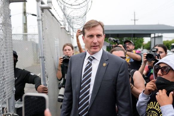 Rep. Dan Goldman, D-N.Y., gets ready to enter the Delaney Hall detention center as a protest against the transfer of detainees takes place on Wednesday, May 27, 2026, in Newark, N.J. (AP Photo/Seth We ...